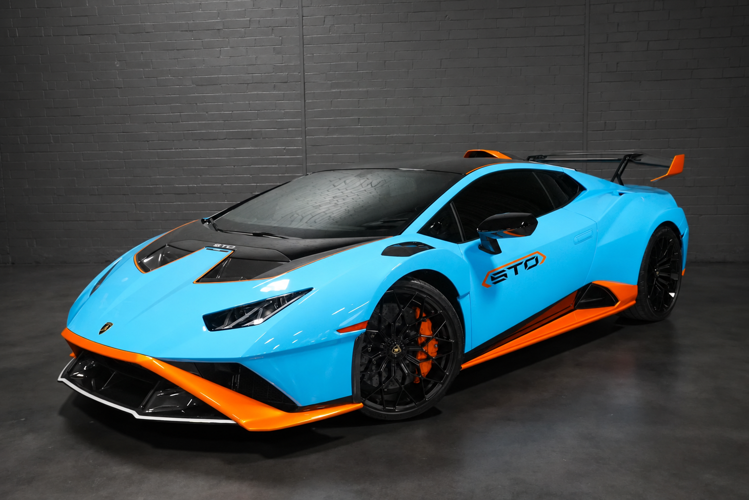 Lamborghini Huracán STO — front three-quarter view